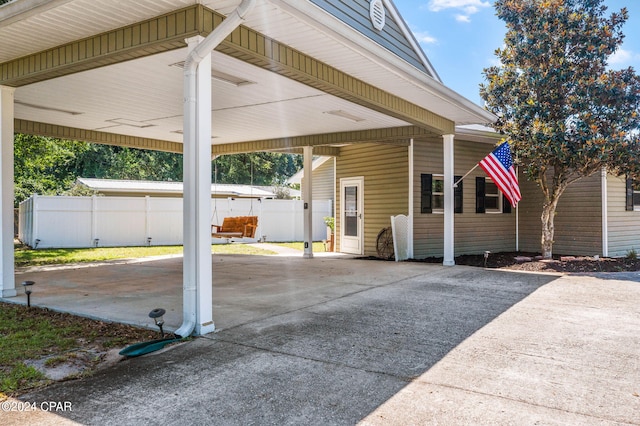 view of patio featuring a carport