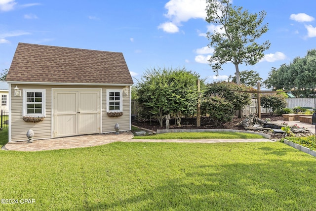 view of yard with a storage shed