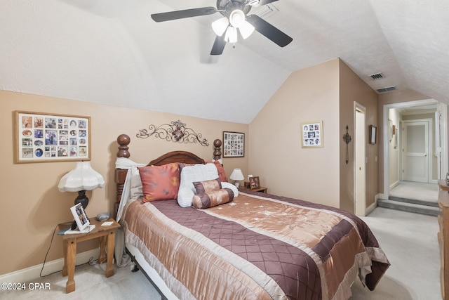 carpeted bedroom featuring ceiling fan and lofted ceiling