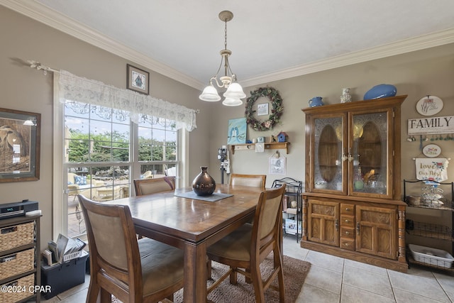 tiled dining space with a chandelier and ornamental molding