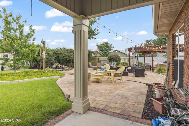 view of patio / terrace with outdoor lounge area and a pergola