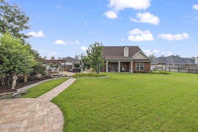 exterior space with a yard and a patio