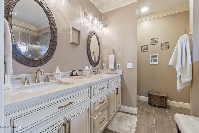 bathroom featuring crown molding, tile patterned flooring, and vanity