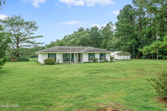 single story home with a front yard