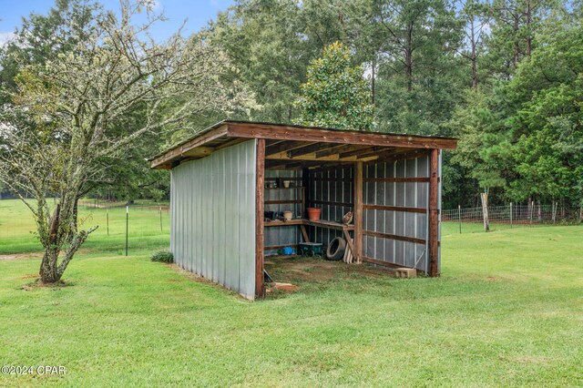 view of outdoor structure with a yard