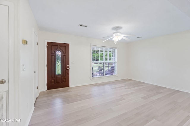 foyer featuring ceiling fan and light hardwood / wood-style flooring