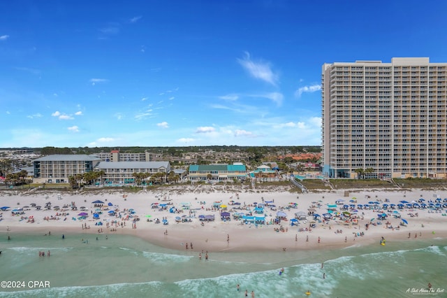 bird's eye view featuring a beach view and a water view