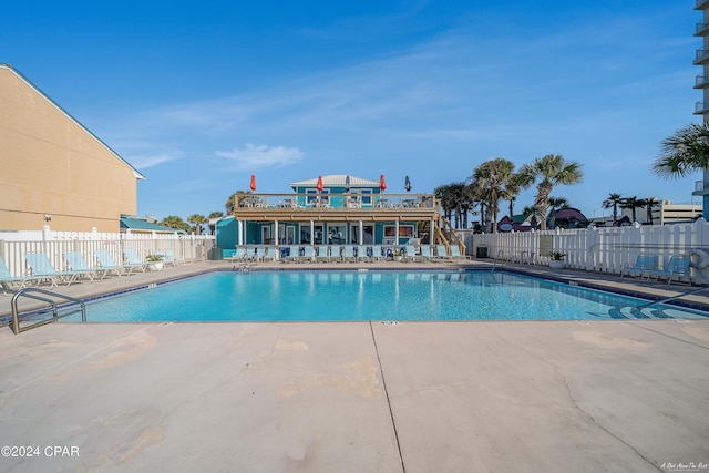 view of pool featuring a patio area