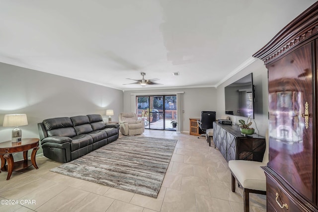 living room with ceiling fan and crown molding