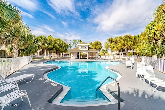 view of swimming pool featuring a patio