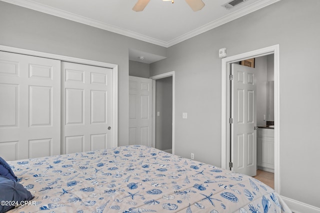 bedroom with ornamental molding, a closet, and ceiling fan