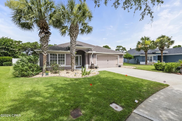 ranch-style house with a front lawn and a garage