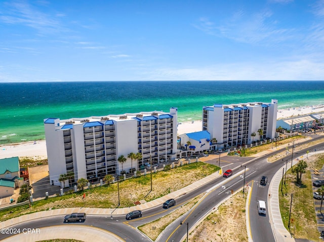 bird's eye view with a view of the beach and a water view