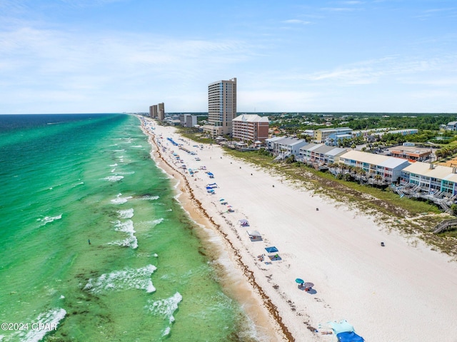 bird's eye view with a view of the beach and a water view