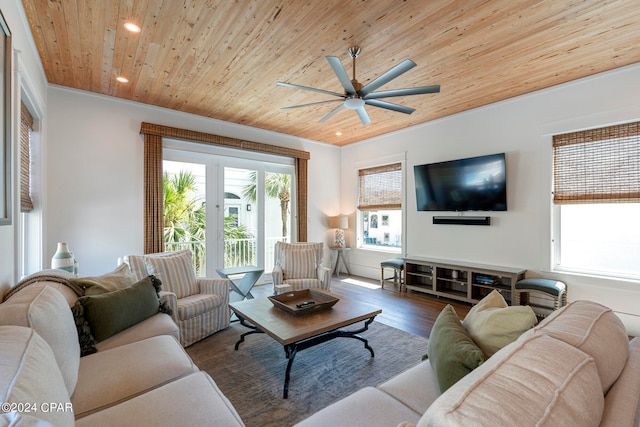 living room with hardwood / wood-style flooring, plenty of natural light, and ceiling fan