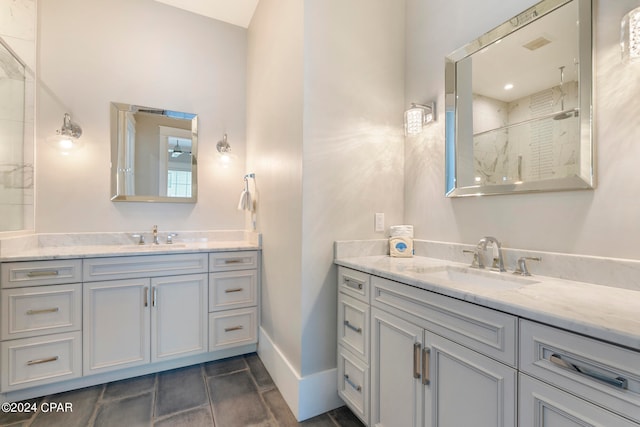 bathroom featuring tile floors and vanity