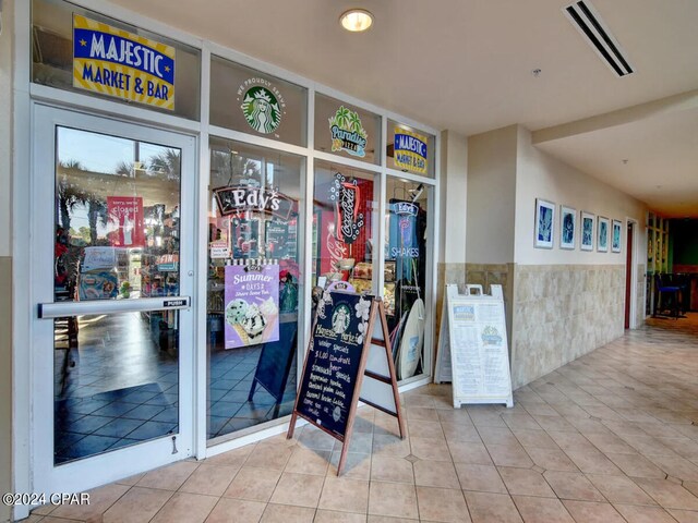 interior space featuring tile walls