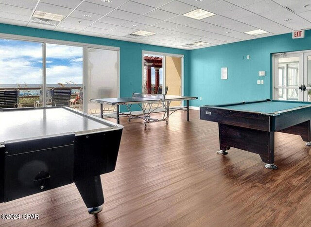 playroom featuring a drop ceiling, hardwood / wood-style flooring, and billiards