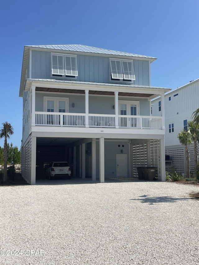 coastal inspired home featuring a carport