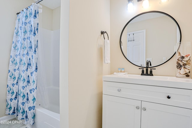 bathroom with vanity and shower / bathtub combination with curtain