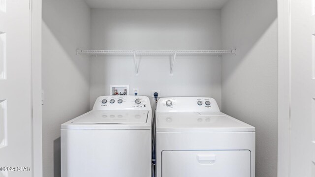 laundry area featuring separate washer and dryer