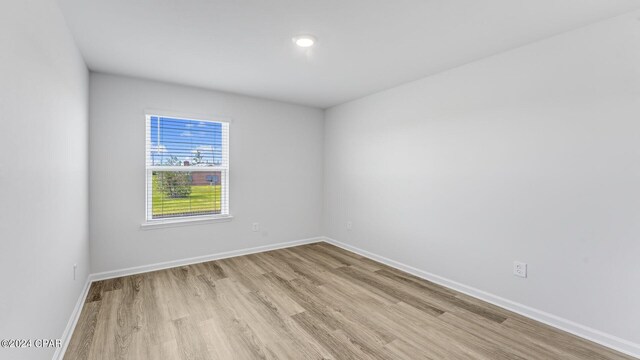 empty room featuring light hardwood / wood-style floors