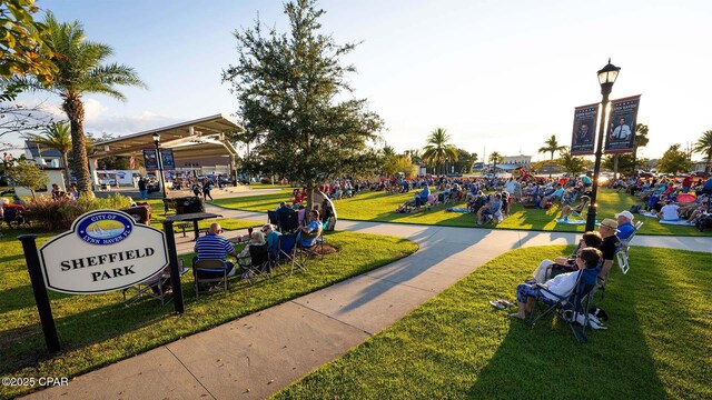 view of community featuring a lawn