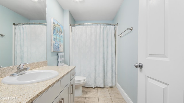 bathroom featuring tile patterned flooring, vanity, toilet, and a shower with shower curtain