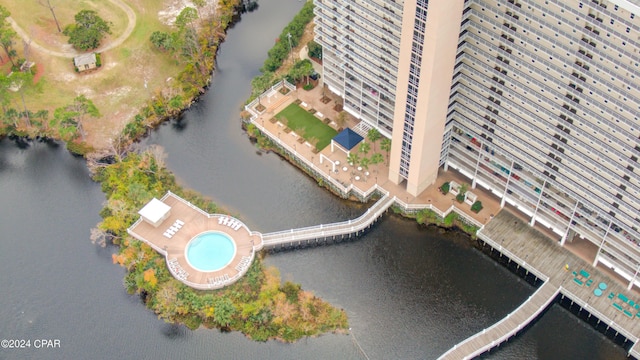 birds eye view of property featuring a water view