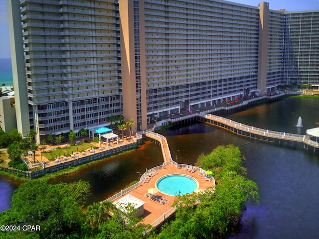 birds eye view of property featuring a water view