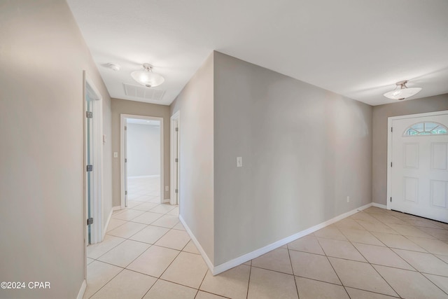 view of tiled foyer entrance