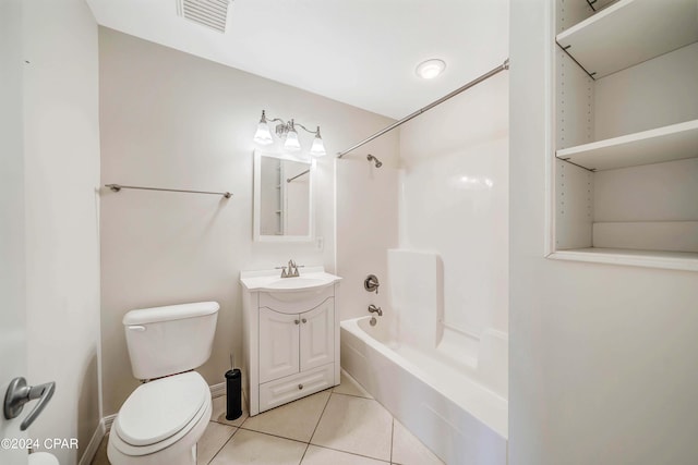 full bathroom featuring vanity, tile patterned flooring, washtub / shower combination, and toilet