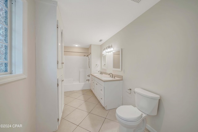 full bathroom with tile patterned flooring, vanity,  shower combination, and toilet