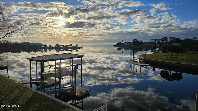 dock area with a water view