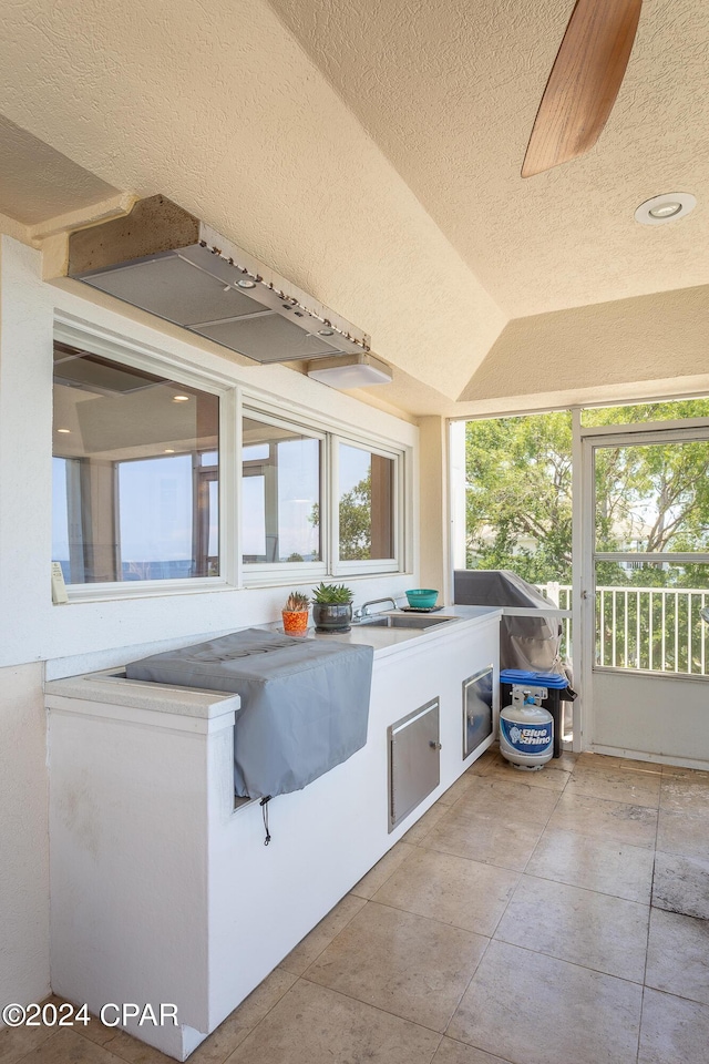 view of patio featuring an outdoor kitchen