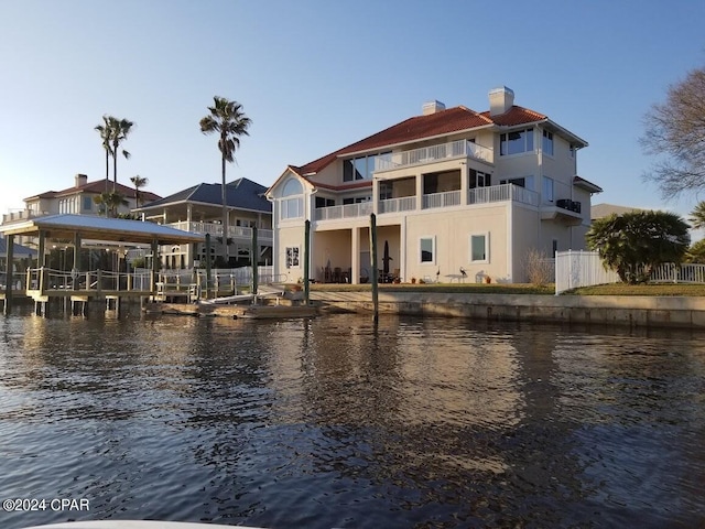 property view of water featuring a boat dock