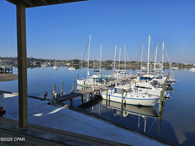 dock area featuring a water view and boat lift