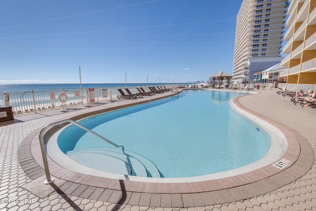 community pool with a water view