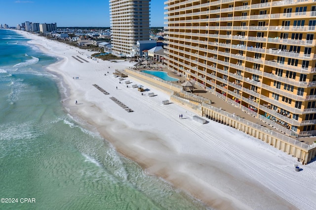 bird's eye view featuring a city view, a beach view, and a water view