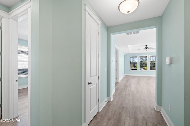 hall featuring light wood-type flooring