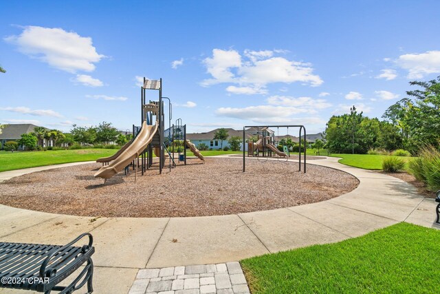 view of playground with a yard