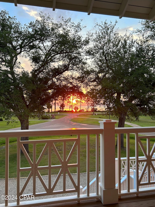 gate at dusk with a yard