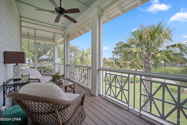 exterior space with ceiling fan