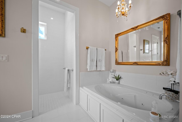 bathroom with plus walk in shower and tile patterned floors