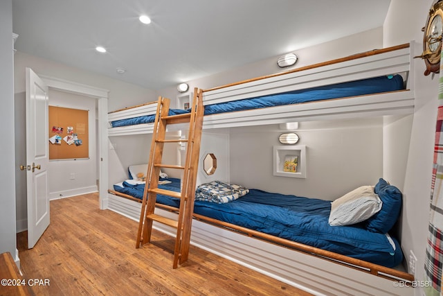 bedroom featuring hardwood / wood-style floors