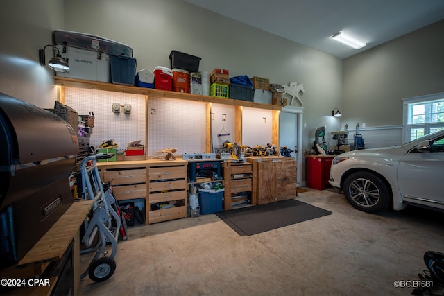 garage with a workshop area