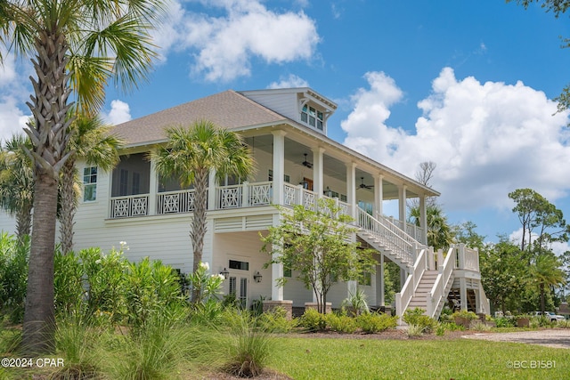 exterior space featuring ceiling fan