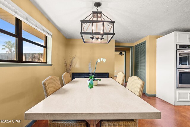 dining room with a chandelier