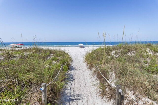 water view featuring a beach view