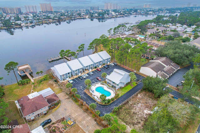 birds eye view of property with a water view